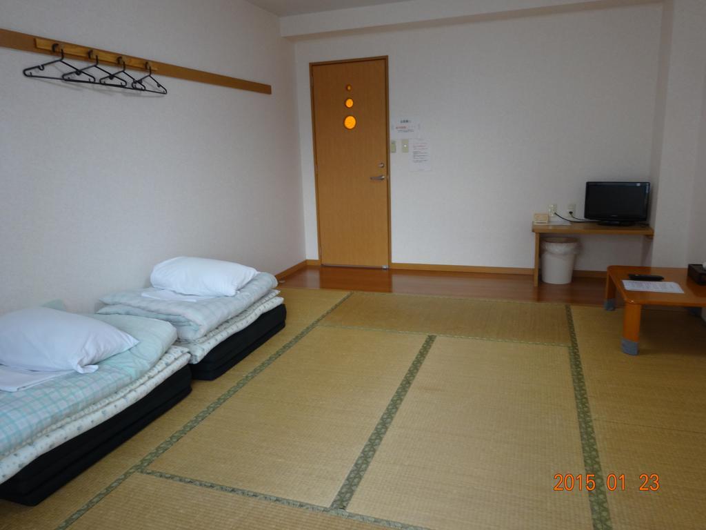 Hotel Minshuku Getto Naha Zimmer foto