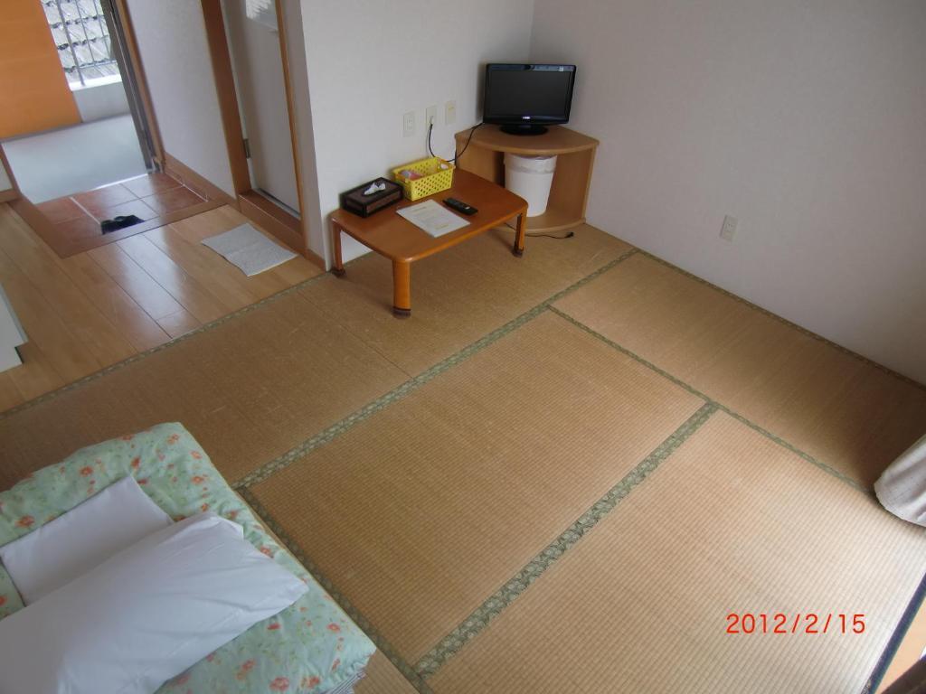 Hotel Minshuku Getto Naha Zimmer foto