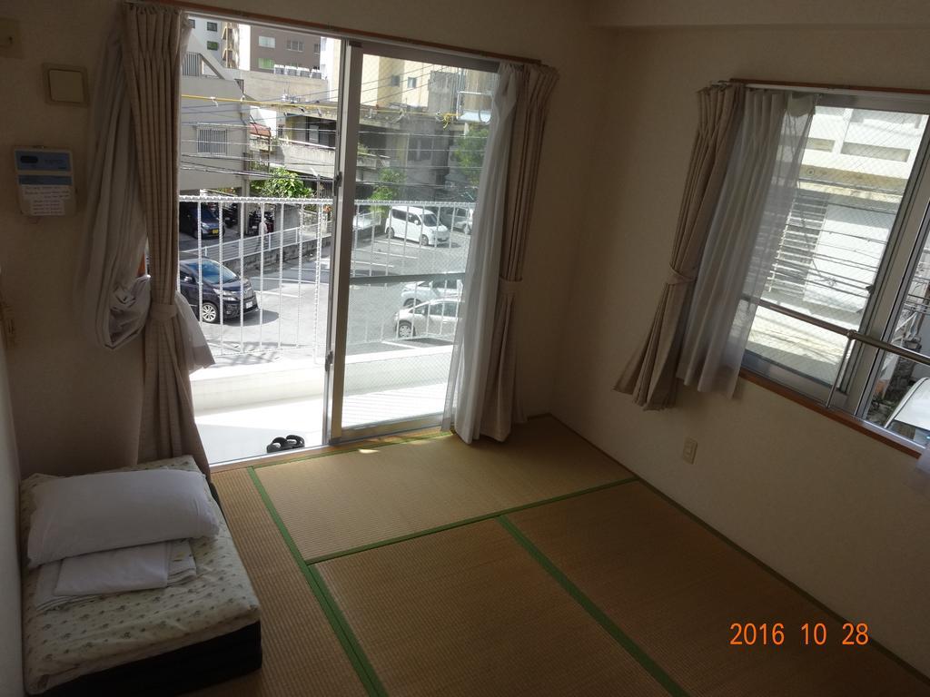 Hotel Minshuku Getto Naha Exterior foto