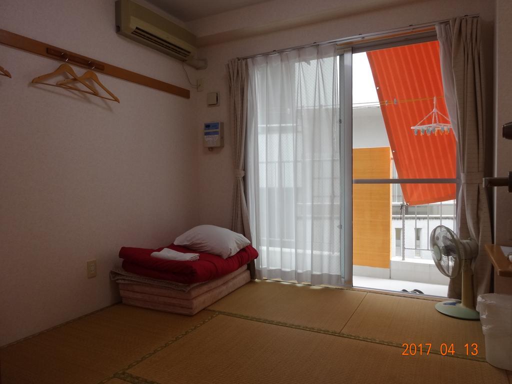 Hotel Minshuku Getto Naha Zimmer foto